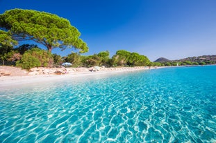 Photo of amazing landscape with wooden pier on Santa Giulia beach, Porto-Vecchio ,France.