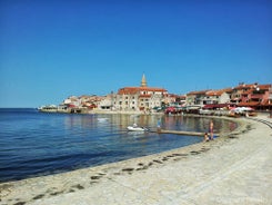 Photo of aerial view of town of Umag historic coastline architecture , archipelago of Istria region, Croatia.