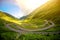 Photo of beautiful landscape from the Fagaras mountains with Transfagarasan winding road, Arefu, Romania.