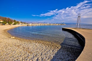 photo of aerial panoramic view of beautiful town of Lovran and sea walkway in Croatia.