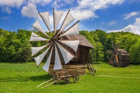 Photo of windmill in Dumbrava Sibiului Natural Park, Sibiu, Romania.