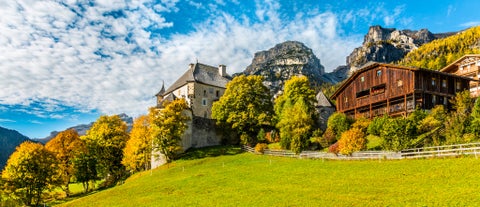 photo of Autumn morning panoramic shot on Stern-La Villa from San Cassiano, Piz la Ila, Gruppo Sella, Sassongher, Piza de Gherdenacia, Peitlerkofel in Italy.