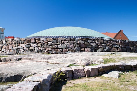 Photo of Stone church Temppeliaukio buried in the rock in Helsinki, Finland.