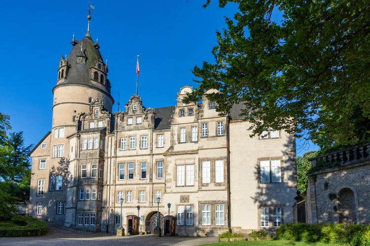 Photo of facade of famous Detmold city castle in morning light, Germany.