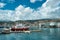 PHOTO OF Old Port Porto Antico of Genoa (Genova) with yachts and boats with aquarium biosphere building under stormy sky. Genoa, Italy