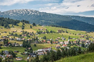 photo of village of Hirschegg in the Kleinwalsertal, Vorarlberg, Austria, with Gottesackerplateau in the background.