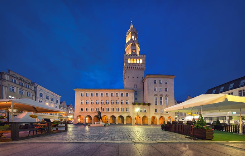 Photo of Rynek square with building of Town Hall at dusk, Opole, Poland.