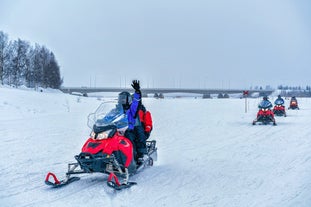 Rovaniemi Finland, panorama of the city with Kemijoki river in the back and Ounasvaara fell with the city heart at the left.