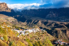 photo of landscape with Maspalomas town and golden sand dunes at sunrise, Gran Canaria, Canary Islands, Spain.