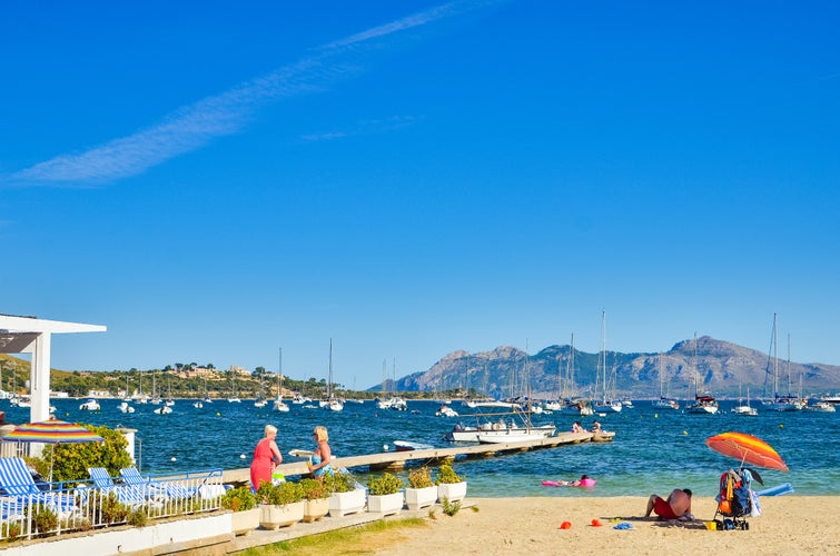 Yacht and boats anchored in port on Mallorca island. Many artists and celebrities chose Port de Pollenca as their home.