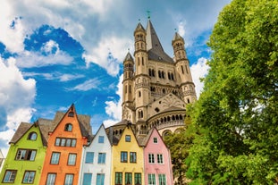 Photo of scenic summer view of the German traditional medieval half-timbered Old Town architecture and bridge over Pegnitz river in Nuremberg, Germany.