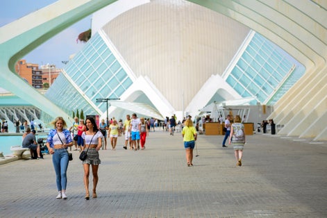 Photo of people visit the City of Arts and Sciences, Oceanographic and hemisphere museum, famous place from Spain.