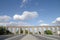 Água de Prata aqueduct on a road under a blue sky in the city of Evora - Portugal