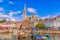  Cork, Ireland. Fishing boats inside the port of Cobh. A city with colorful houses in Ireland.