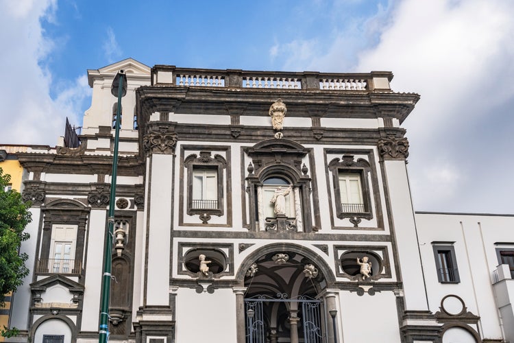 photo of view of 16th century basilica dedicated to Santa Maria degli Angeli alle Croci on the Veterinaria street in Napoli, Italy.