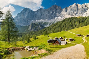 Photo of Suspension Bridge of Dachstein Skywalk viewpoint in Austria, with people, in Ramsau am Dachstein.