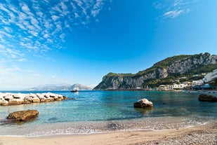 Photo of aerial view of Capri island in a beautiful summer day in Italy.