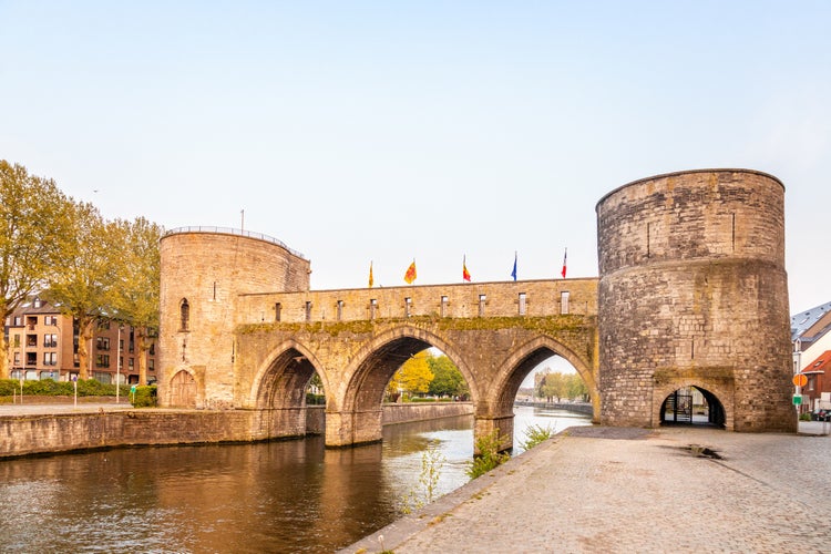 Photo of bridge of holes or Pont des Trous, the medieval bridge across the river Escaut, Tournai, Belgium.