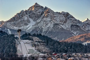 photo of Alpine aerial summer view with the famous Nordkette mountains seen from Serle's cable car station, Mieders, Stubaital valley, Innsbruck, Austria.