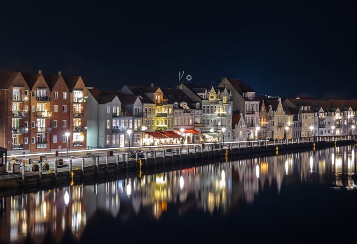 Night skyline city lights panorama of Sønderborg Havn (Sonderborg pier) before Christmas. Southern Denmark.