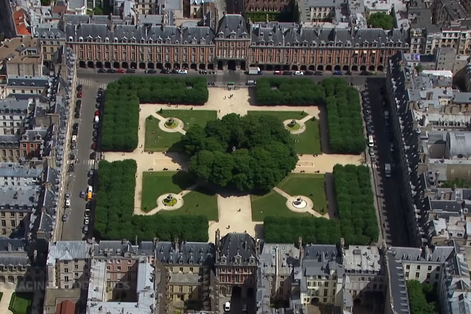photo of aerial view of Place des Vosges in the Marais district of Paris, France.