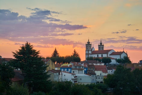 photo of the historical center of the city of Seia at sunset time, in the Serra da Estrela, Portugal.