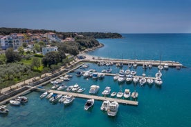 Photo of aerial view of beautiful town of Medulin waterfront view, Istria region of Croatia.