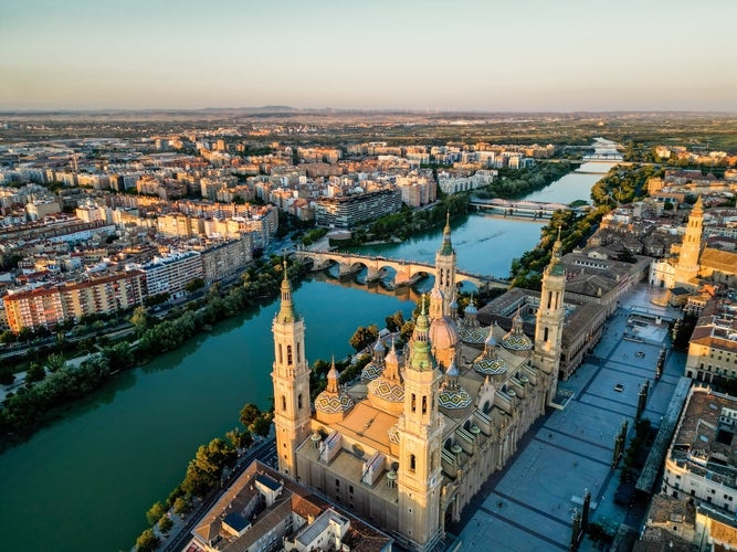 Spectacular Zaragoza city skyline at sunset. View of old town center, Cathedral of Zaragoza and Ebro River..jpg