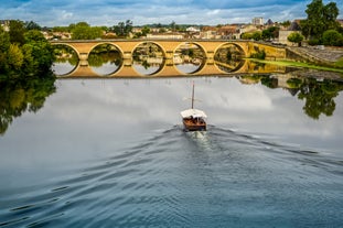 photo of the Bergerac town from bridge over Dordogne River in France.