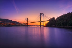 Photo of Ourense city with bridge and river Minho in Spain.