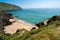 photo of Coumeenoole Beach view of sea, rocks and large cliffs near Dunquin pier via Slea Head Drive on Dingle Peninsula on the Wild Atlantic Way in Kerry on the west coast of Ireland. 