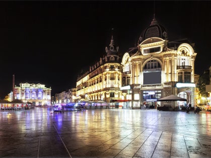 photo of Comedy Square at night in Montpellier, France.