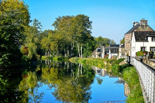 Photo of traditional half-timbered houses in the old town of Rennes, Brittany, France.