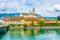 photo of riverside of Aare passing through Solothurn is dominated by Saint Ursus Cathedral, Switzerland.