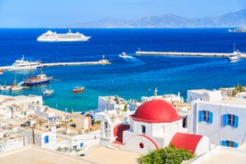 Photo of beautifull view over Mykonos from the sky with drone at the whitewashed village Greece.