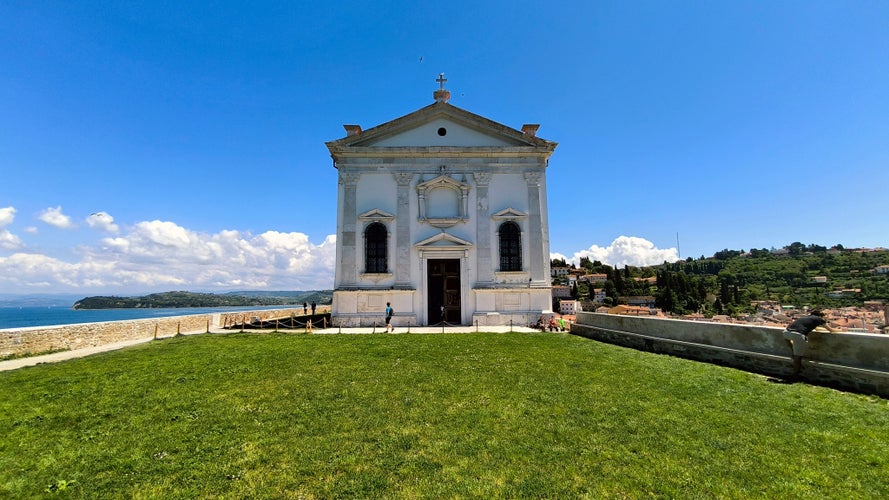 Photo of The church of saint george, piran, slovenia, europe.