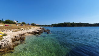 Photo of aerial view of town of Umag historic coastline architecture , archipelago of Istria region, Croatia.