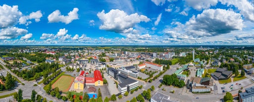 Early autumn morning panorama of the Port of Turku, Finland, with Turku Castle at background.