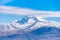 photo of clouds on a volcanic Mount Erciyes is reaching a height of 3,864 m it the highest mountain and most voluminous volcano in Kayseri, Turkey.