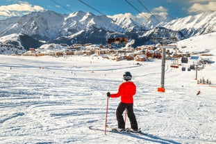 Photo of aerial view of spectacular winter landscape and mountain ski resort in French Alps ,Alpe D Huez, France.