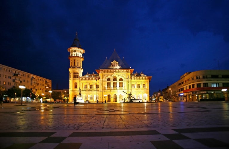 Buzau city hall at night, Romania.The Communal Palace in Dacia Square, BuzÃ?Â?u