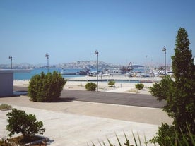 Photo of  A popular beach on the city coast, Piraeus, Greece.