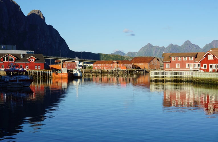 Photo of Scenic view of the waterfront harbor and traditional houses in Svolvaer in summer. 