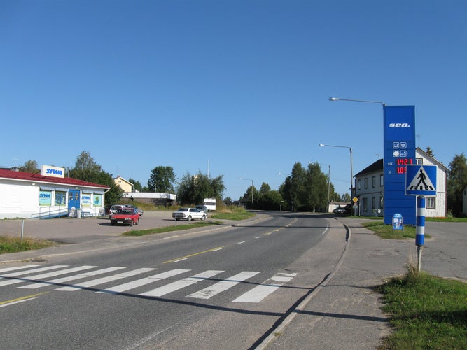 Photo of The centre of the Pelkosenniemi municipality, Finland. Highway 5 (E63) on the foreground.