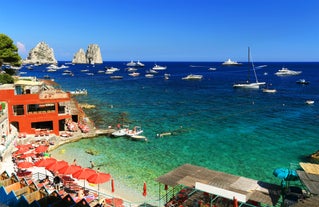 Photo of aerial view of Capri island in a beautiful summer day in Italy.