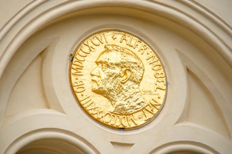 Facade detail of the Nobel Peace Center in Oslo, Norway decorated with an enlarged copy of the Nobel Peace Prize medal.