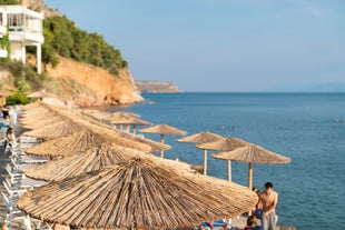 Photo of a small island with a fortress at the coast of Nafplio ,Greece.