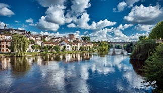 photo of the Bergerac town from bridge over Dordogne River in France.