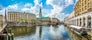 Beautiful view of Hamburg city center with town hall and Alster river, Germany.