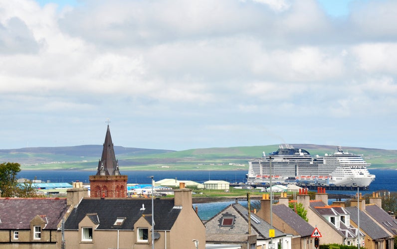 photo of landscape of the island of Kirkwall in the background cruise ship MSC in Scotland.